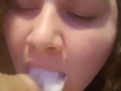 woman sucking dildo