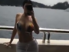 &#039;Kylie J.&#039; in a bikini on a boat