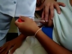 Filipina pumping tit milk for nurse