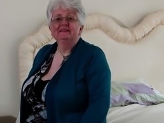 Voluptuous grandma gets naked and masturbates with a sex toy