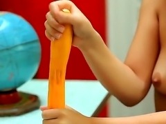 Teen bitch Monroe got in her hands big yellow dildo toy and naughtily posing with it and demonstrating precious young and juicy boobies!