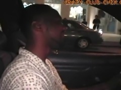 A Haitian cab driver doesn't know what to make of his fare - a guy in the front filming a girl flashing in the back seat. She sits forward to flirt with the driver, rubbing his crotch.
