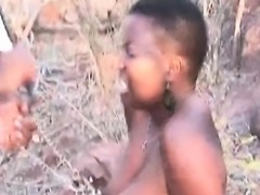 Busty Africa slave gets tied and spanked in nature