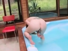 Long curly haired redhead gets off in jacuzzi