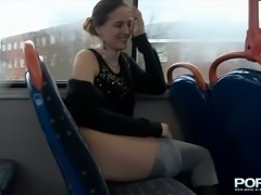 Amateur dark haired chick flashes her bum and pisses in the public bus