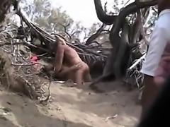 Couple of babes caught by hidden cam on nude beache