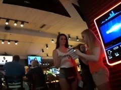 Sultry brunette waitress with a magnificent ass and hot legs