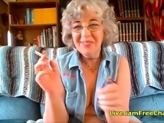 Hot Granny with Short Curly Hair and Glasses has Young Pussy