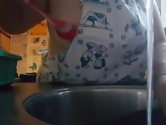 Horny doing the dishes