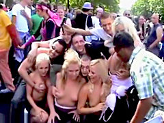 Amateur blondes topless on public crowd